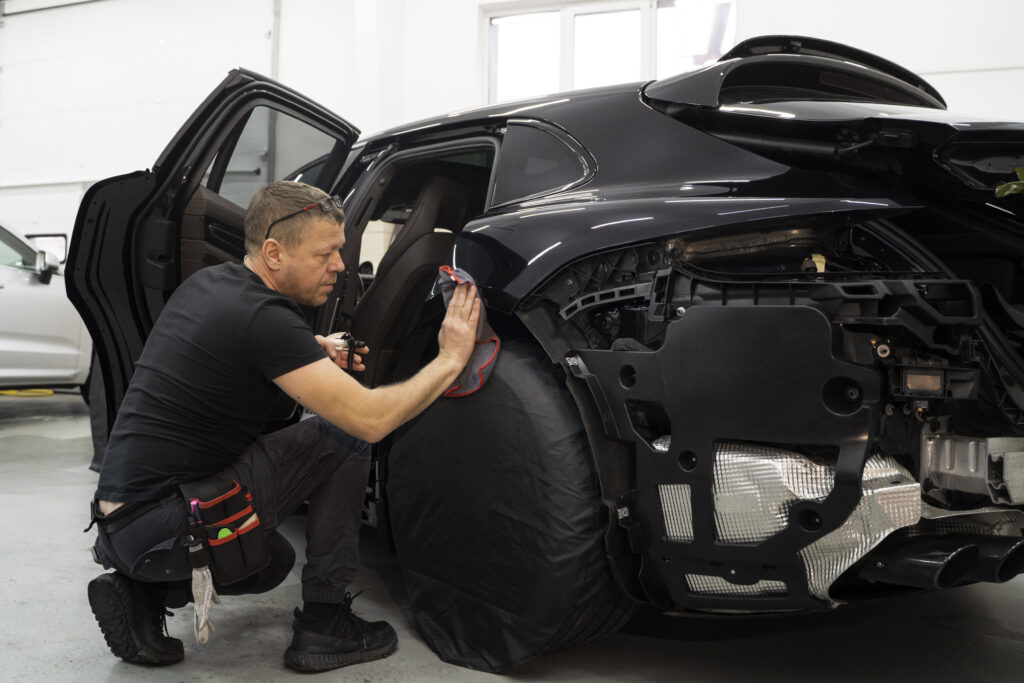 person working car wrapping